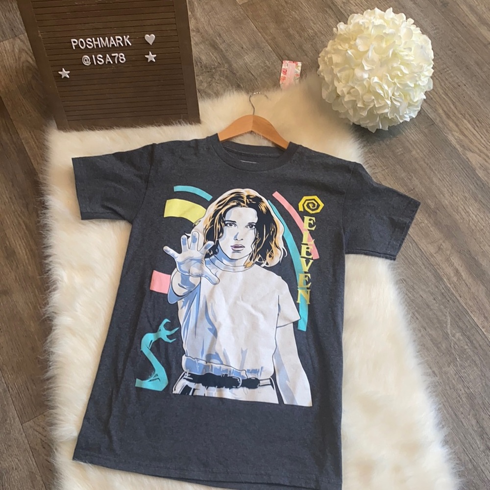 STRANGER THINGS ELEVEN T-SHIRT.